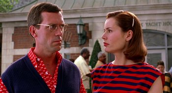 Movie still from “Stuart Little” (1999), directed by Rob Minkoff – A man and a woman standing next to each other in front of a building; Close Up shot, Low angle