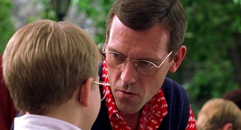 Movie still from “Stuart Little” (1999), directed by Rob Minkoff – An older man and a young boy looking at each other; Close Up shot, Over the shoulder angle