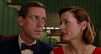 Movie still from “Stuart Little” (1999), directed by Rob Minkoff – A man and a woman looking at one another; Close Up shot, Over the shoulder angle