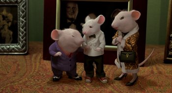 Movie still from “Stuart Little” (1999), directed by Rob Minkoff – A group of mice standing next to each other on the floor; Medium shot, High angle