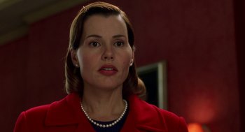 Movie still from “Stuart Little” (1999), directed by Rob Minkoff – A person wearing a red jacket; Close Up shot, Low angle