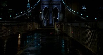 Movie still from “Stuart Little” (1999), directed by Rob Minkoff – A view of a bridge at night from the sidewalk; Extreme Wide shot, High angle