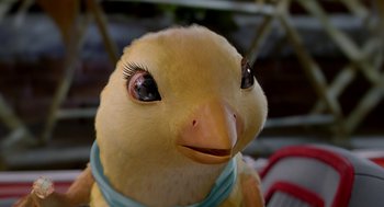 Movie still from “Stuart Little 2” (2002), directed by Rob Minkoff – A stuffed bird wearing a collar; Extreme Close Up shot, High angle