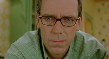 Movie still from “Stuart Little 2” (2002), directed by Rob Minkoff – A person wearing glasses; Close Up shot, Over the shoulder angle