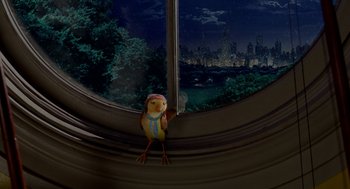 Movie still from “Stuart Little 2” (2002), directed by Rob Minkoff – A toy bird sitting on top of a window sill; Wide shot, High angle