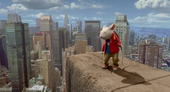 Movie still from “Stuart Little 2” (2002), directed by Rob Minkoff – A mouse standing on top of a rock ledge; Extreme Wide shot, High angle
