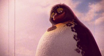 Movie still from “Surf's Up” (2007), directed by Chris Buck – An animated bird is standing next to a white ball; Close Up shot, Low angle