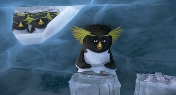 Movie still from “Surf's Up” (2007), directed by Chris Buck – A stuffed penguin sitting on top of a piece of paper; Medium shot, High angle