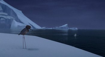 Movie still from “Surf's Up” (2007), directed by Chris Buck – A bird standing on top of a snow covered slope; Extreme Wide shot, High angle