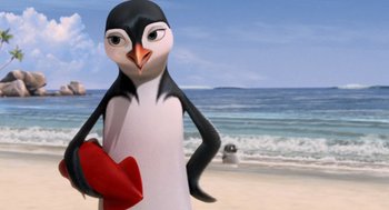 Movie still from “Surf's Up” (2007), directed by Chris Buck – A penguin is standing on the beach holding a red heart; Close Up shot, Low angle