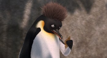 Movie still from “Surf's Up” (2007), directed by Chris Buck – An animated penguin is eating a piece of food; Close Up shot, High angle