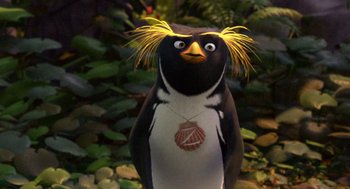 Movie still from “Surf's Up” (2007), directed by Chris Buck – A stuffed penguin wearing a necklace; Close Up shot, High angle