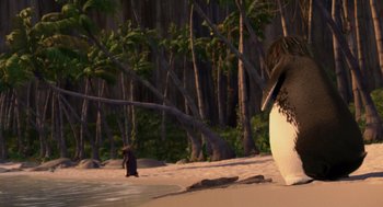 Movie still from “Surf's Up” (2007), directed by Chris Buck – An animated scene of a penguin walking on the beach; Wide shot, Low angle