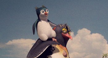 Movie still from “Surf's Up” (2007), directed by Chris Buck – A penguin on top of a bird; Close Up shot, Low angle