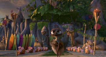 Movie still from “Surf's Up” (2007), directed by Chris Buck – An animated bird standing in the middle of a forest; Wide shot, Low angle