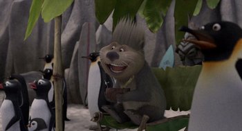 Movie still from “Surf's Up” (2007), directed by Chris Buck – A cartoon of a squirrel sitting in a palm tree; Medium shot, High angle
