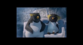 Movie still from “Surf's Up” (2007), directed by Chris Buck – A couple of penguins sitting next to each other on some ice; Close Up shot, Low angle
