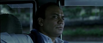 Movie still from “Like Stars on Earth” (2007), directed by Aamir Khan – A person sitting in a vehicle; Close Up shot, Low angle