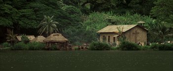 Movie still from “Tears of the Sun” (2003), directed by Antoine Fuqua – A small hut in the middle of the jungle; Extreme Wide shot, High angle