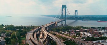 Movie still from “The Bounty Hunter” (2010), directed by Andy Tennant – An aerial view of a bridge and a highway; Extreme Wide shot, High angle