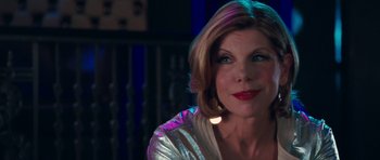 Movie still from “The Bounty Hunter” (2010), directed by Andy Tennant – A person with short blonde hair; Close Up shot, Over the shoulder angle