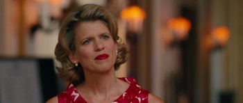 Movie still from “The Bounty Hunter” (2010), directed by Andy Tennant – A person wearing a dress; Close Up shot, Over the shoulder angle