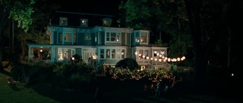 Movie still from “The Bounty Hunter” (2010), directed by Andy Tennant – A house that has a lot of lights in it; Extreme Wide shot, High angle