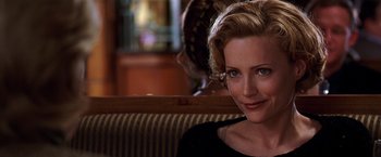 Movie still from “The Cable Guy” (1996), directed by Ben Stiller – A person sitting on a couch; Close Up shot, Over the shoulder angle