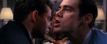 Movie still from “The Cable Guy” (1996), directed by Ben Stiller – Two men face to face in a room; Close Up shot, Low angle