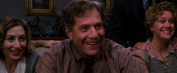 Movie still from “The Cable Guy” (1996), directed by Ben Stiller – A person wearing a shirt and a tie; Close Up shot, Low angle