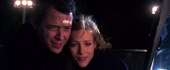Movie still from “The Cable Guy” (1996), directed by Ben Stiller – A man and a woman with bandages on their heads; Close Up shot, Low angle
