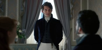 Movie still from “Bridgerton” (2020), created by Chris Van Dusen – A man in a suit standing in front of a window; Medium shot, Over the shoulder angle