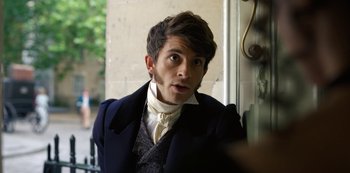 Movie still from “Bridgerton” (2020), created by Chris Van Dusen – A man in a suit and tie looking at the camera; Close Up shot, Over the shoulder angle