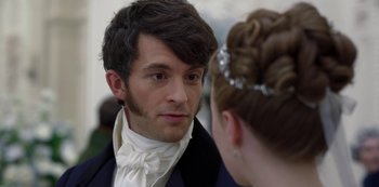 Movie still from “Bridgerton” (2020), created by Chris Van Dusen – A man and a woman in formal clothing talking to each other; Close Up shot, Over the shoulder angle