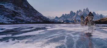Movie still from “The Dark Crystal: Age of Resistance” (2019), created by Jim Henson – A view of a frozen lake with mountains in the background; Extreme Wide shot, High angle