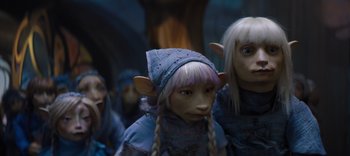Movie still from “The Dark Crystal: Age of Resistance” (2019), created by Jim Henson – A group of people dressed up like elves; Medium shot, High angle
