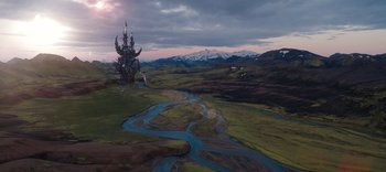 Movie still from “The Dark Crystal: Age of Resistance” (2019), created by Jim Henson – An aerial view of a castle on top of a hill; Extreme Wide shot, High angle