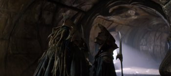 Movie still from “The Dark Crystal: Age of Resistance” (2019), created by Jim Henson – A couple of people that are standing in a cave; Close Up shot, Low angle