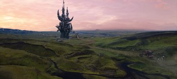 Movie still from “The Dark Crystal: Age of Resistance” (2019), created by Jim Henson – An aerial view of a castle on top of a hill; Extreme Wide shot, High angle