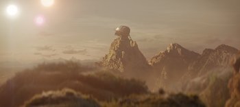 Movie still from “The Dark Crystal: Age of Resistance” (2019), created by Jim Henson – An image of an alien ship on top of a mountain; Extreme Wide shot, Low angle