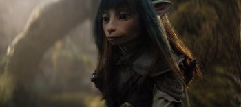 Movie still from “The Dark Crystal: Age of Resistance” (2019), created by Jim Henson – The head and shoulders of a creature; Close Up shot, High angle