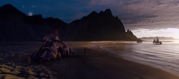 Movie still from “The Dark Crystal: Age of Resistance” (2019), created by Jim Henson – A group of people standing on top of a sandy beach; Extreme Wide shot, High angle