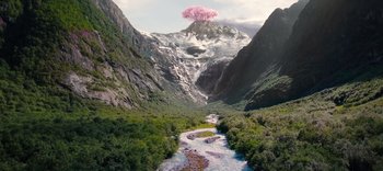 Movie still from “The Dark Crystal: Age of Resistance” (2019), created by Jim Henson – An image of a pink cloud in the sky above a mountain; Extreme Wide shot, High angle