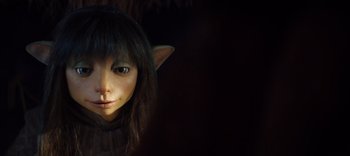 Movie still from “The Dark Crystal: Age of Resistance” (2019), created by Jim Henson – A woman's face with a cat's ears; Close Up shot, High angle