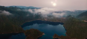 Movie still from “The Dark Crystal: Age of Resistance” (2019), created by Jim Henson – A body of water surrounded by a mountain range; Extreme Wide shot, High angle