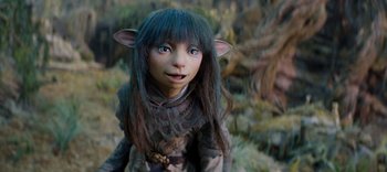 Movie still from “The Dark Crystal: Age of Resistance” (2019), created by Jim Henson – A doll with long black hair; Close Up shot, High angle