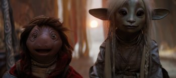 Movie still from “The Dark Crystal: Age of Resistance” (2019), created by Jim Henson – A couple of puppets that are sitting next to each other; Close Up shot, Low angle
