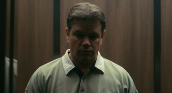 Movie still from “Air” (2023), directed by Ben Affleck – A person wearing a green shirt; Close Up shot, Low angle