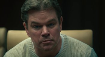 Movie still from “Air” (2023), directed by Ben Affleck – A person wearing a sweater; Close Up shot, Over the shoulder angle