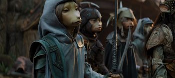 Movie still from “The Dark Crystal: Age of Resistance” (2019), created by Jim Henson – A group of people dressed up like animals holding a sword; Close Up shot, High angle